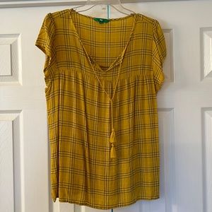 Peasant style top with tassel tie.